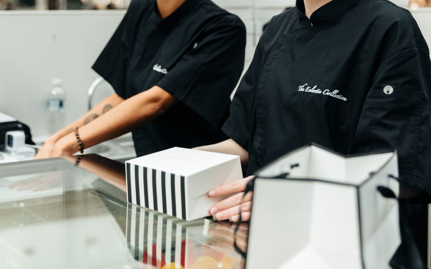 An order boxed and ribboned at the counter